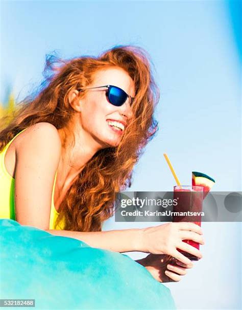 2,967 Red Head Swimsuit Stock Photos & High